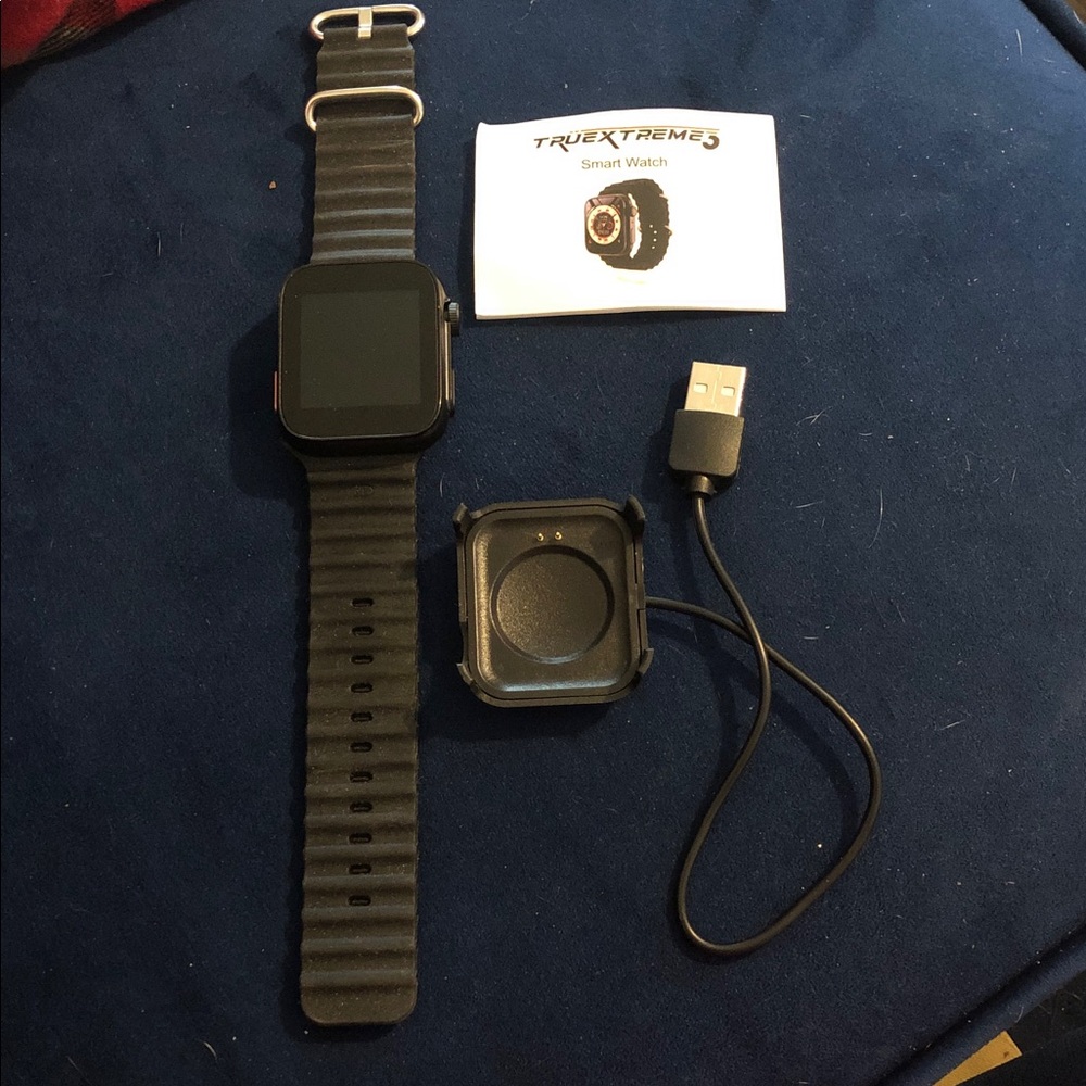 Black Smartwatch with USB Charging Cable
